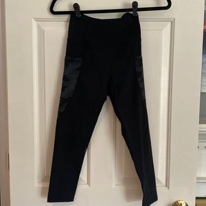 ZYIA Capri length black leggings with pockets and reflective Camo details